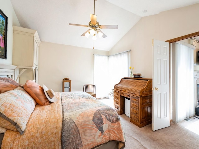 bedroom with vaulted ceiling, a ceiling fan, and light colored carpet