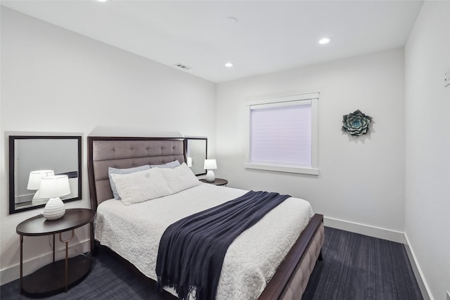 bedroom with baseboards, visible vents, and recessed lighting