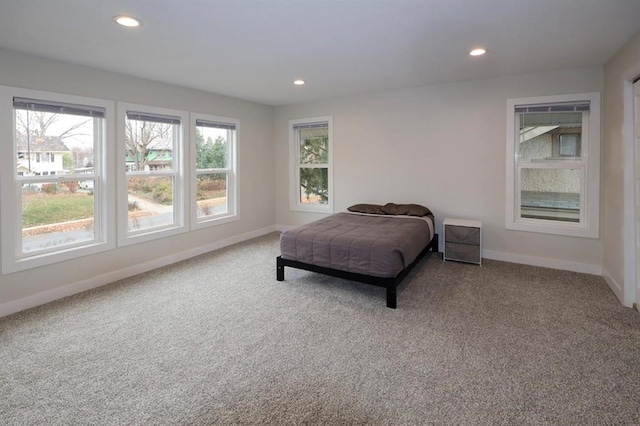 bedroom with carpet floors, recessed lighting, and baseboards