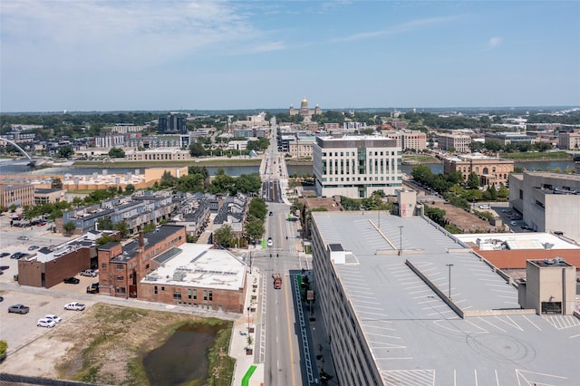 drone / aerial view featuring a water view and a city view