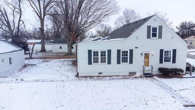 view of front facade featuring entry steps, roof with shingles, and crawl space