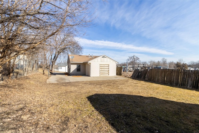 view of yard with a patio and fence