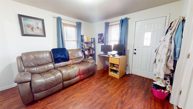 living room with wood finished floors