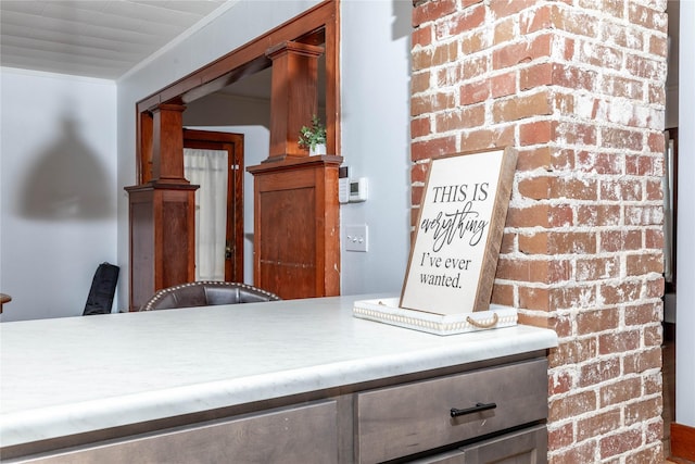 room details with crown molding and decorative columns