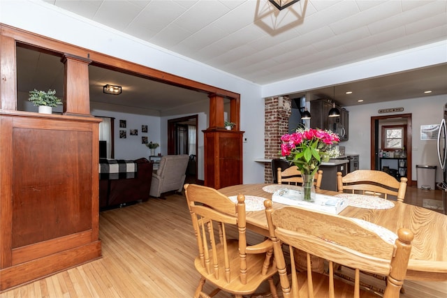 dining area with light wood-type flooring