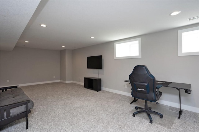 carpeted office featuring baseboards, a wealth of natural light, visible vents, and recessed lighting