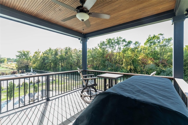 wooden deck with ceiling fan