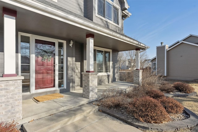 entrance to property with covered porch