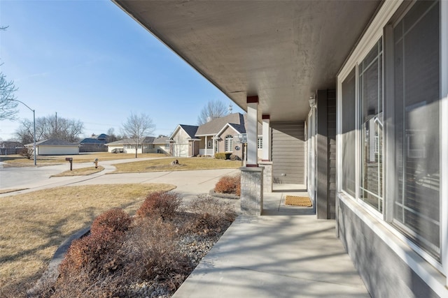 view of yard featuring a residential view