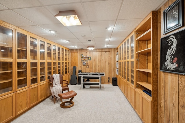 365 Williamson Ct, Pleasant Hill, IA 50327 - sitting room with wooden walls, carpet, recessed lighting, and a drop ceiling