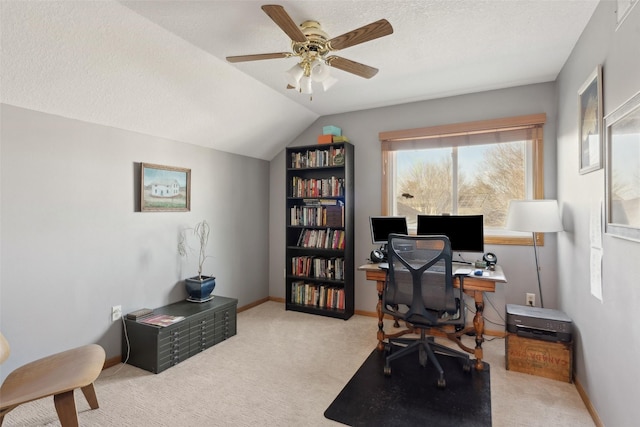 365 Williamson Ct, Pleasant Hill, IA 50327 - carpeted office featuring lofted ceiling, a textured ceiling, a ceiling fan, and baseboards