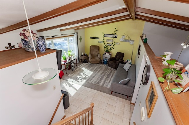 living area featuring lofted ceiling with beams and light tile patterned floors