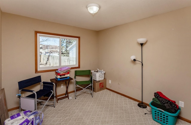 playroom with light carpet and baseboards