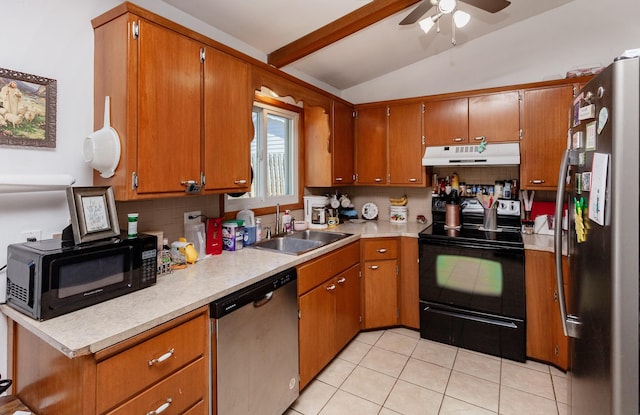 kitchen featuring light countertops, a sink, under cabinet range hood, and black appliances