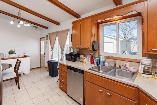 kitchen with light countertops, a sink, beamed ceiling, and stainless steel dishwasher