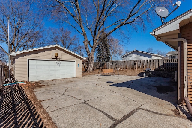 detached garage with fence