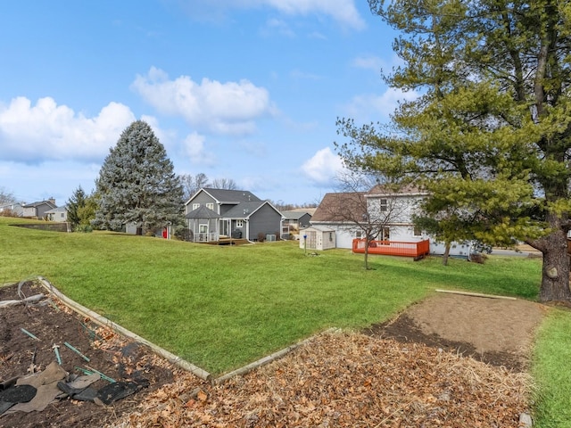 view of yard featuring a deck