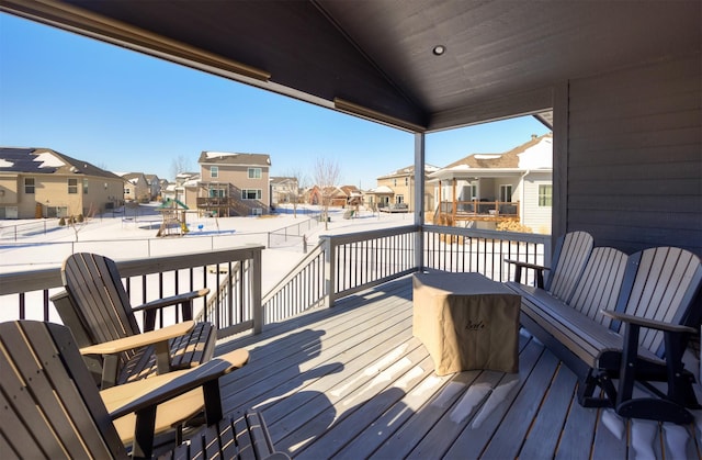 wooden deck with a residential view