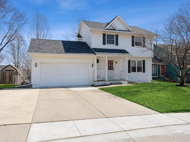 traditional home featuring roof with shingles, concrete driveway, an attached garage, fence, and a front lawn