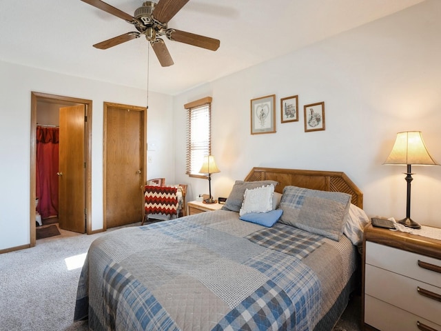 carpeted bedroom featuring ceiling fan, baseboards, and two closets