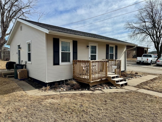 view of front of house featuring a deck