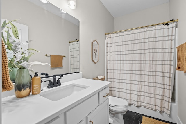 bathroom featuring tile patterned flooring, shower / tub combo with curtain, vanity, and toilet