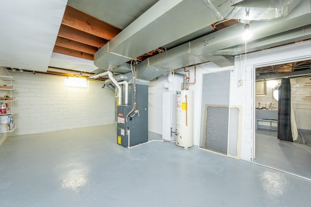 basement with water heater and heating unit