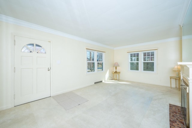 foyer entrance featuring a baseboard radiator, a fireplace, crown molding, and carpet flooring