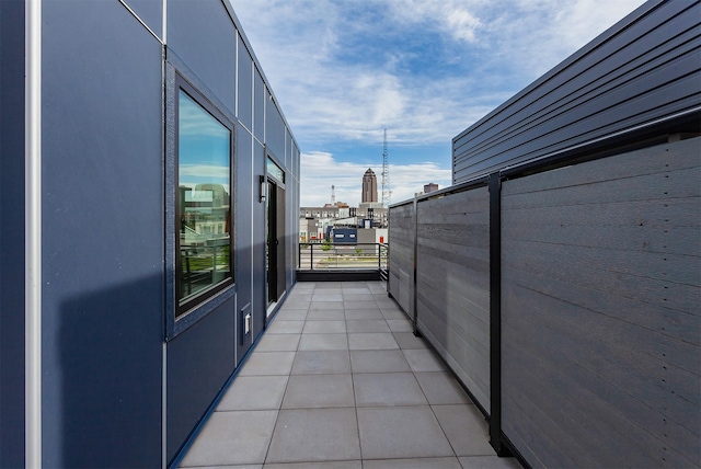 1160 Murphy St, Des Moines, IA 50309 - view of patio featuring a balcony