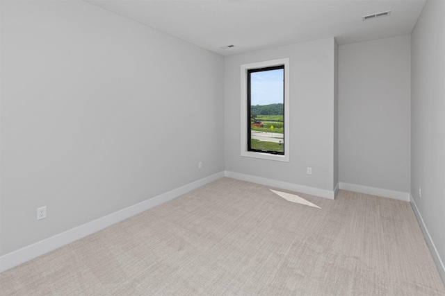1160 Murphy St, Des Moines, IA 50309 - carpeted empty room with baseboards