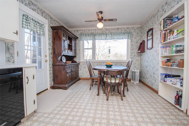 dining room featuring wallpapered walls, wine cooler, a wealth of natural light, and crown molding