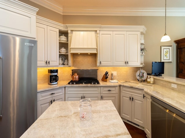 kitchen featuring tasteful backsplash, ornamental molding, stainless steel appliances, premium range hood, and open shelves