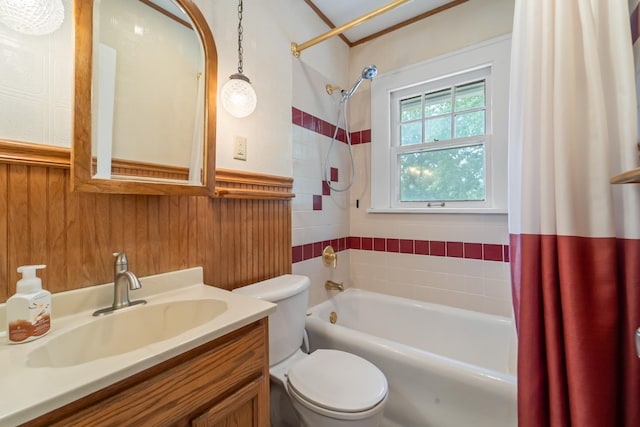 6015 Waterbury Cir, Des Moines, IA 50312 - full bath with shower / tub combo, toilet, vanity, and a wainscoted wall