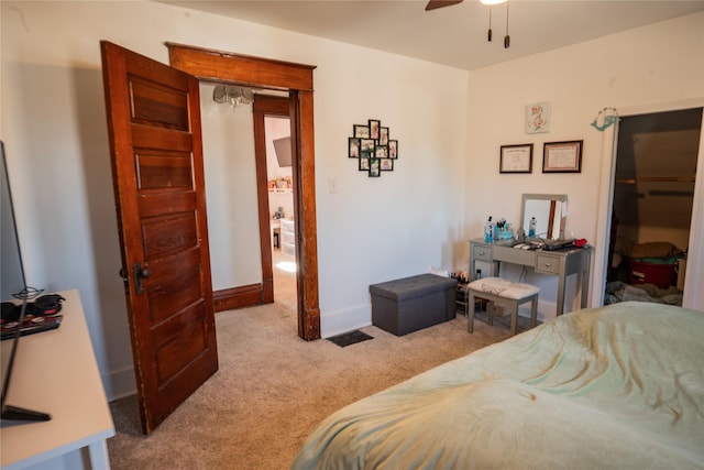 bedroom with carpet floors, baseboards, and a ceiling fan