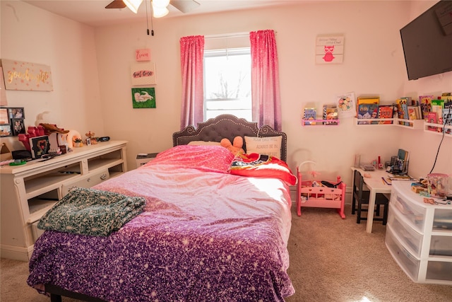 carpeted bedroom with a ceiling fan