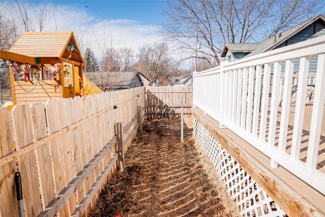 view of side of property featuring a fenced backyard