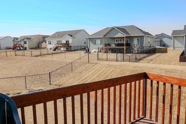 view of yard featuring a residential view and fence