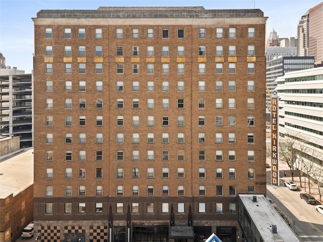 view of building exterior featuring a view of city