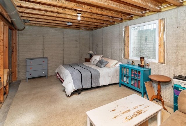 bedroom with brick wall