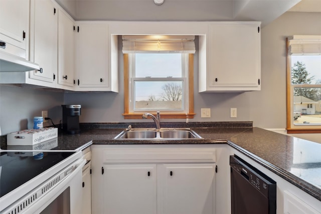 kitchen featuring under cabinet range hood, a sink, white cabinets, dishwasher, and dark countertops