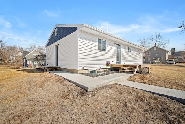 exterior space with a front lawn