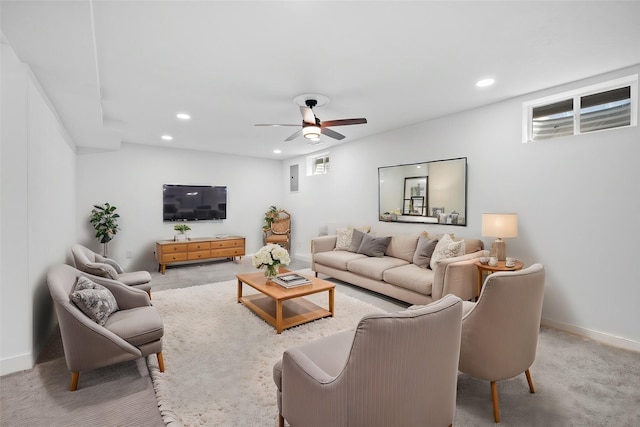 carpeted living room featuring recessed lighting, baseboards, and ceiling fan