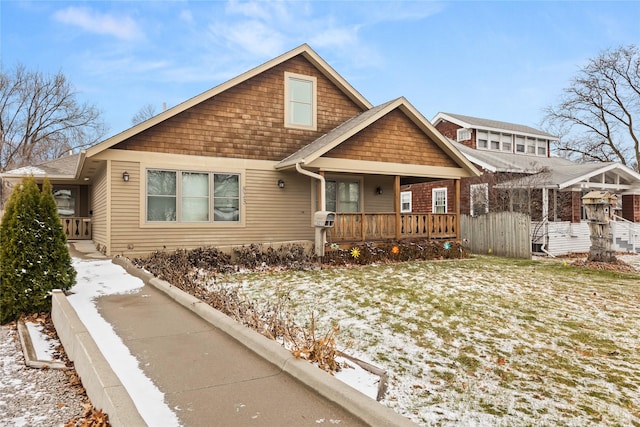 view of front of property featuring covered porch