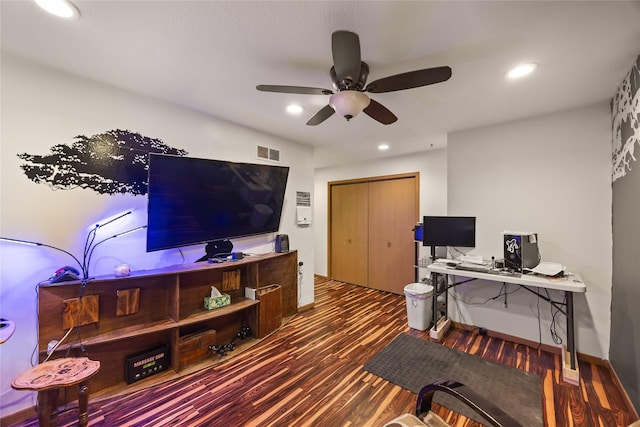 office space featuring baseboards, visible vents, wood finished floors, and recessed lighting