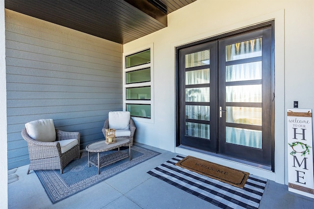 doorway to property featuring french doors