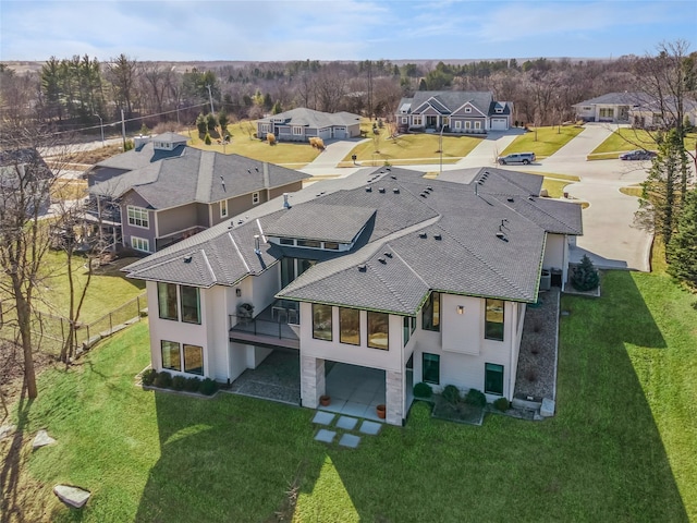 drone / aerial view featuring a residential view