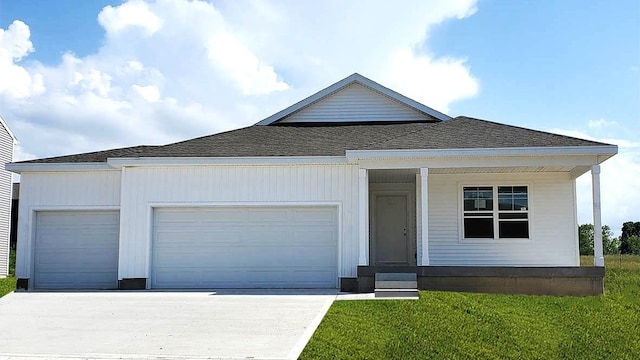 ranch-style house with a front lawn, driveway, a shingled roof, and an attached garage