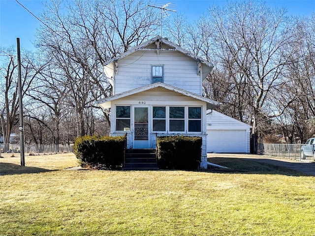 view of front facade with a garage, a front yard, fence, and entry steps