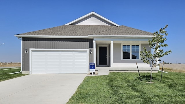 single story home with a garage, concrete driveway, roof with shingles, and a front lawn