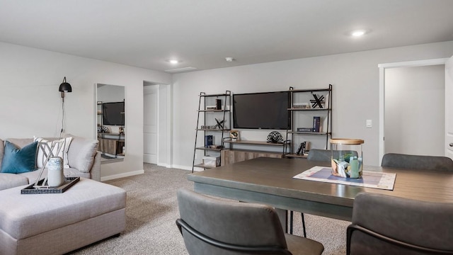 carpeted office space featuring recessed lighting and baseboards